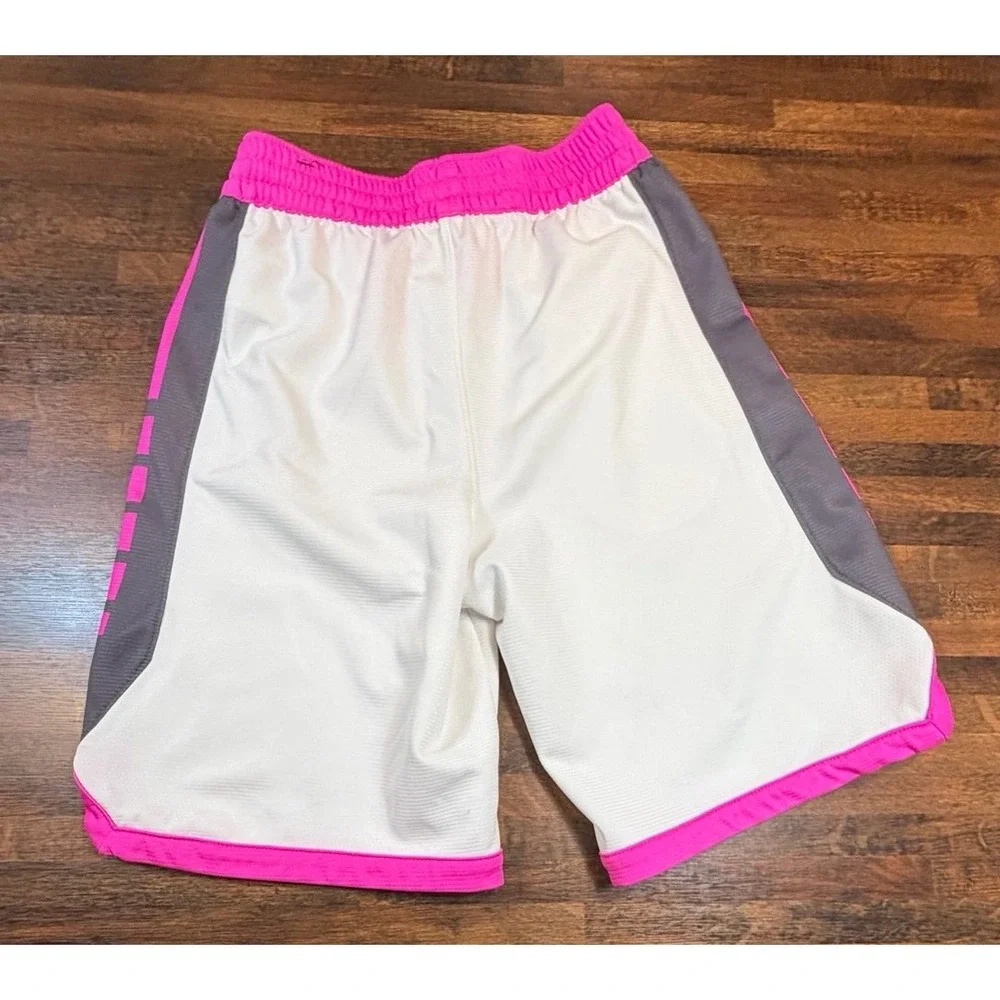 Youth dri-fit Nike Elite basketball shorts pink and white.  Size large.  Unisex